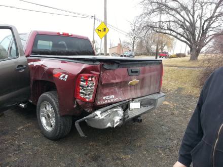 Pickup truck with rear end damage